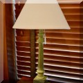 D12. One of a pair of green table lamps. 